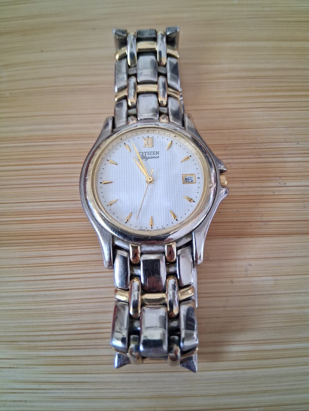 CITIZEN TWO-TONE STAINLESS STEEL EATCH WITH GOLD ACCENTS